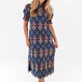 The Torian Ruffle Neck Midi Dress