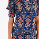 The Torian Ruffle Neck Midi Dress